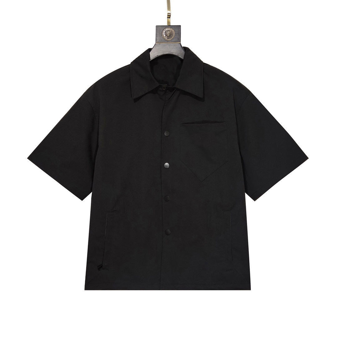 23 años camisa de manga corta clásica europea y americana solapa de verano de los hombres Polo suelta invertida triángulo bordado Diseño superior