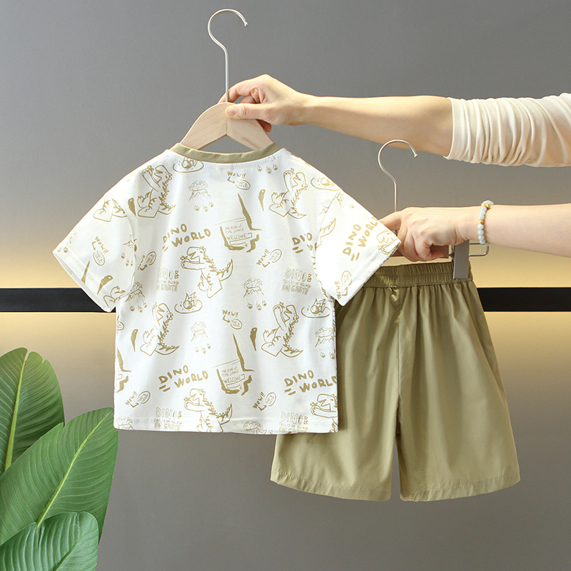 7277 Traje de verano para niños 2025 nuevo estilo estilo occidental dibujos animados para niños dinosaurio de manga corta bebé verano delgado dos piezas