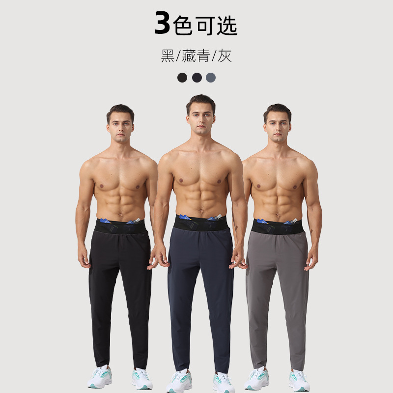 Pantalones deportivos de los hombres de otoño e invierno nuevo de larga distancia maratón de entrenamiento multi-funcional bolsa de cintura impermeable de bolsillo pantalones de secado rápido