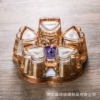 Flavored tea, golden teapot