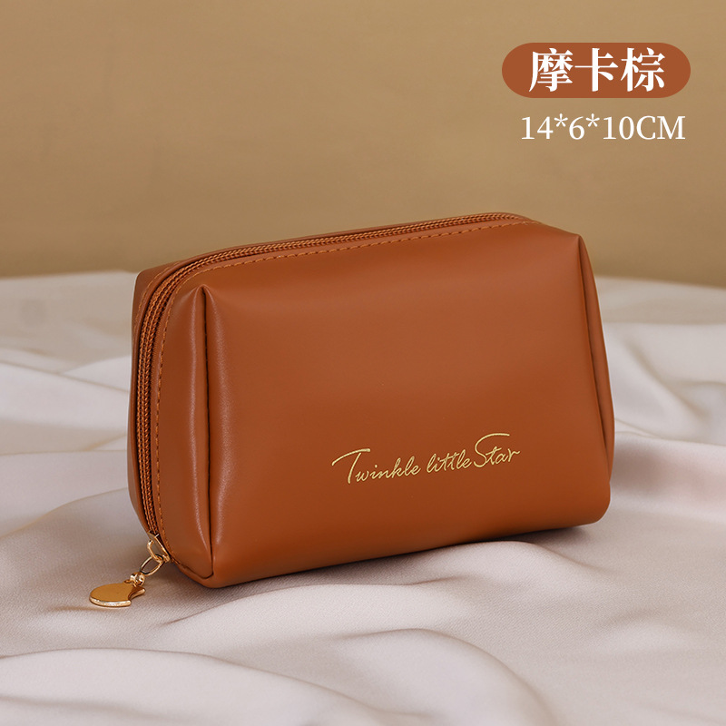 Bolsa de maquillaje portátil de alto valor bolsa de almacenamiento pequeña de mano bolsa de bolsa de cosméticos PU bolsa de cosméticos al por mayor bolsa de cosméticos cosméticos