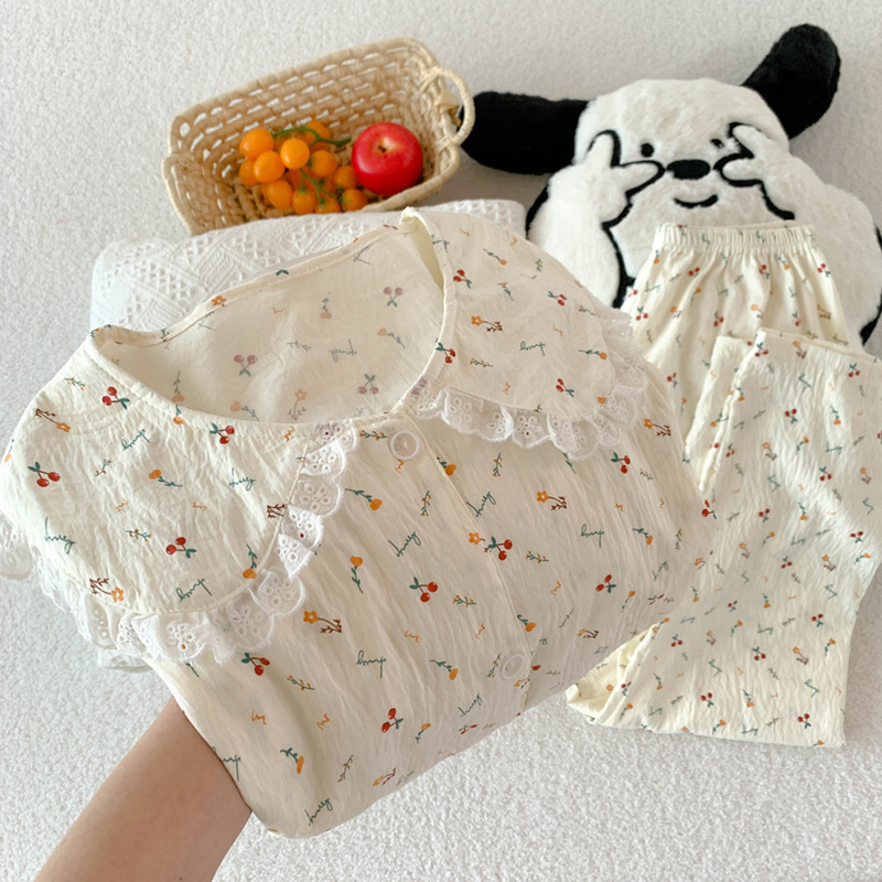 韓国系のさくらんぼの小さい花の子供の襟の雲の綿のパジャマの女性の春秋の金の甘い家の服のスーツは実際に卸売りをたたきます。|undefined