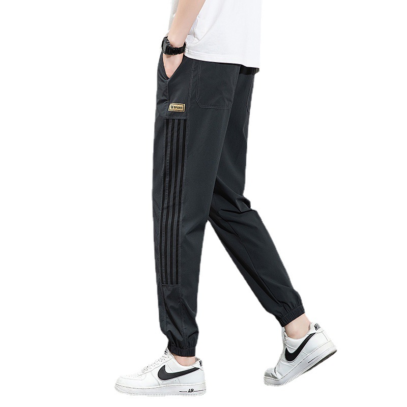 Pantalones de seda de hielo, pantalones deportivos de secado rápido de verano para hombres, pantalones casuales de nueve puntos sueltos y delgados de la marca de moda, pantalones casuales de nueve puntos al por mayor