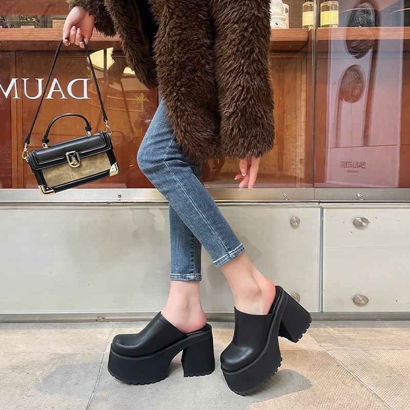 Elegant mule with extremely high heels platform