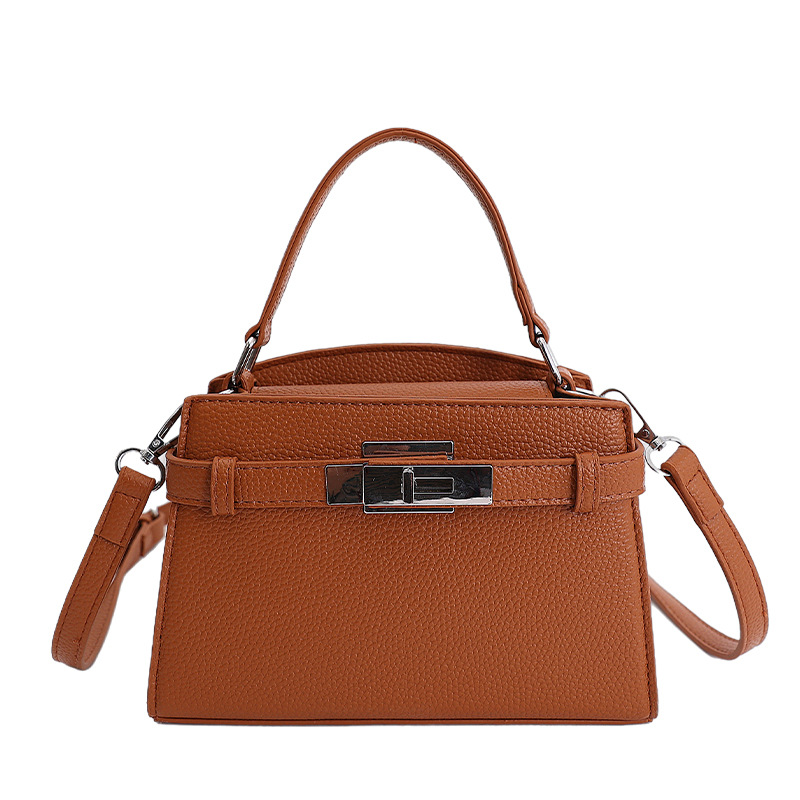 Bolso de mano de alto nivel de estilo occidental para mujeres 2026 nuevo retro nicho Kelly bolsa de viaje universal mochila de hombro