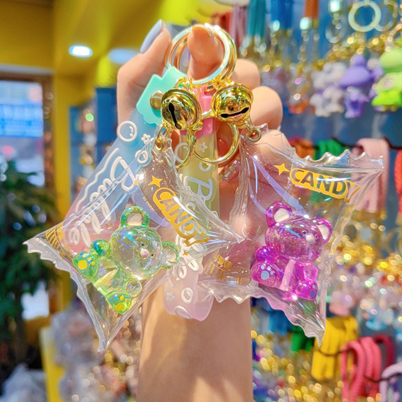 Caramelos inflados de color permeable osos llaveros bolsos de automóviles colgantes llaveros adorable osos accesorios colgantes al por mayor