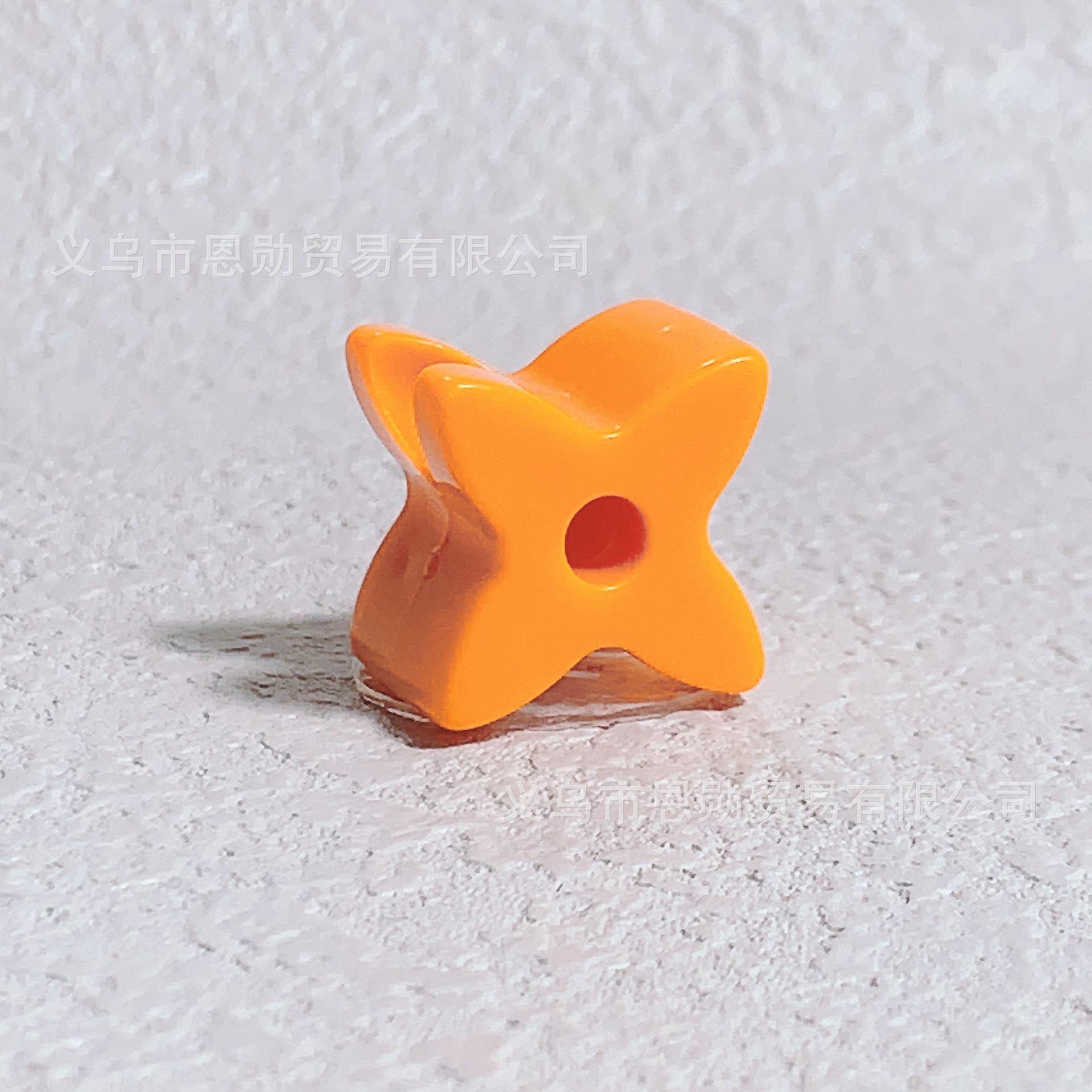 X (orange)