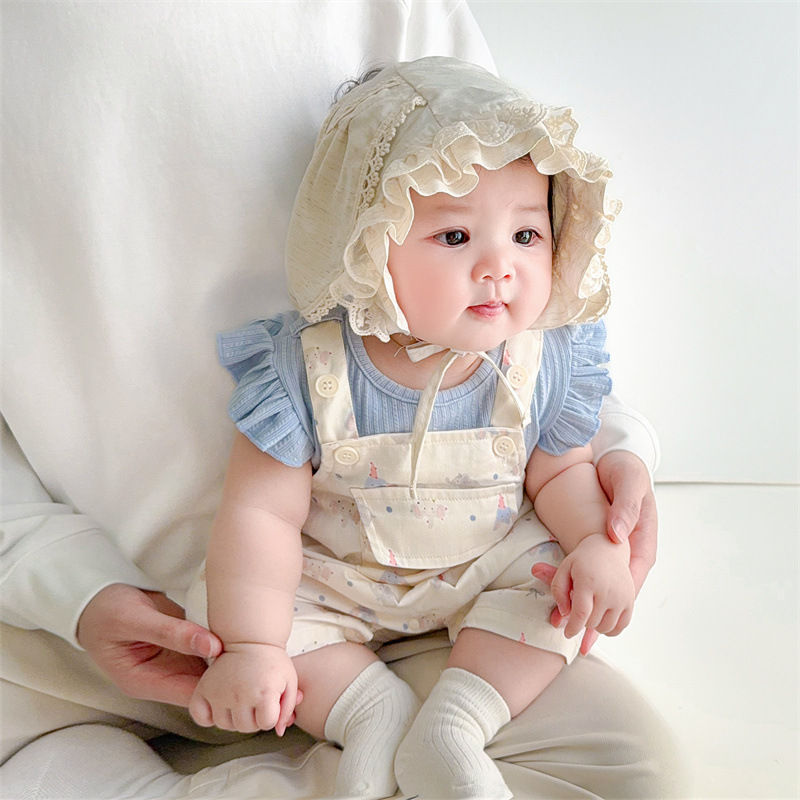 Sombrero de bebé primavera y verano nuevo estilo protector solar para bebés, encaje para bebés y niños pequeños, gorras de palacio de luna pequeña, gorras de protección para los oídos de fontanela