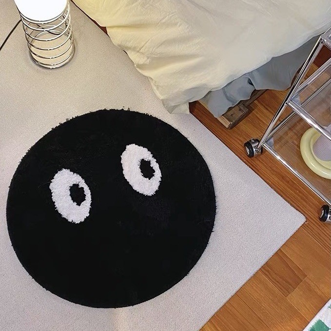 Transfronterizo lindo negro alfombra redonda dormitorio cabecera casa alfombra ins creativo pequeña alfombra de cara negra