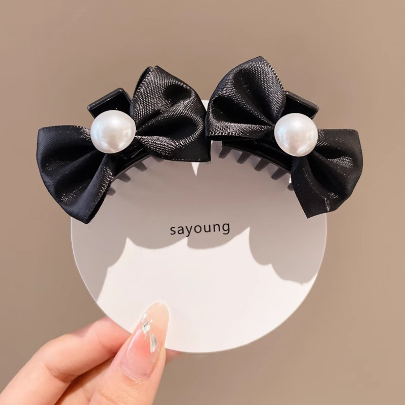 Clips de agarre de arco negro pequeño para mujeres frente retro clips de bangs 2025 nuevo clips de cabello princesa accesorios para el cabello