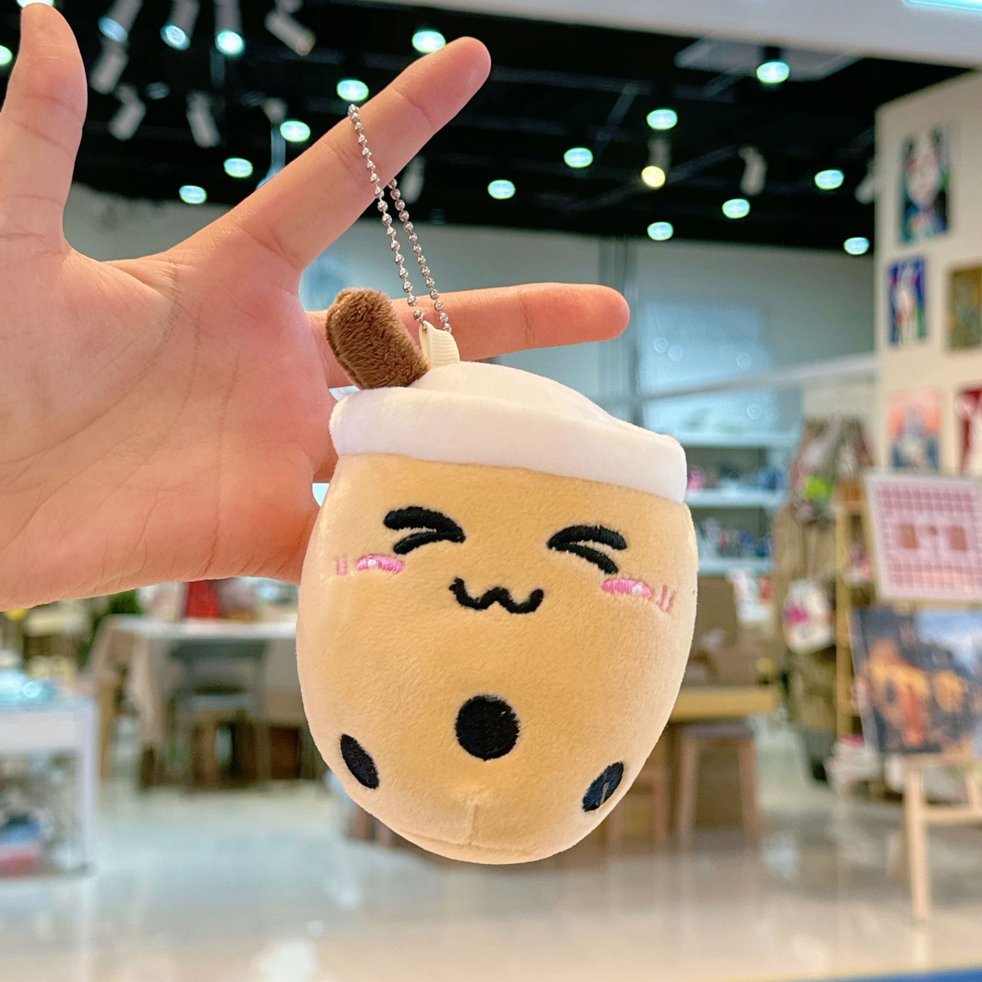 Brown squinting soft cute milk tea+bead chain