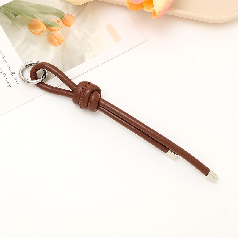 Nuevo tipo de cuerdas de cuero PU llavero colgante in bolsos de moda colgante cadena accesorios DIY tejido a mano