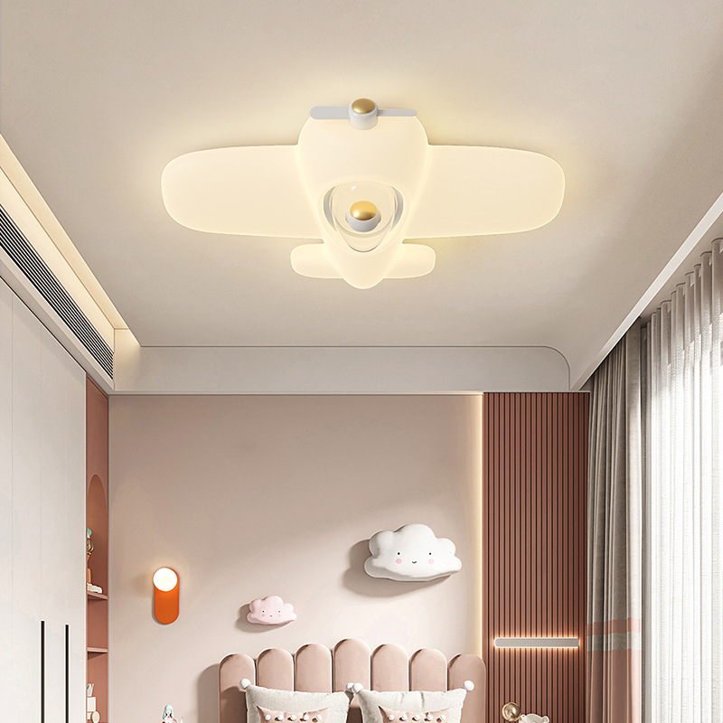 Luz de lujo ligera de la habitación de niños en línea chico moderno y minimalista luz de dormitorio avión creativo inteligente LED luz de techo nuevo