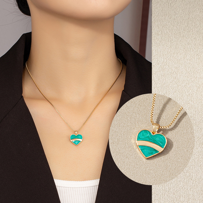 Simple New Heart Shaped Pendant Contrast Color Necklace Wholesale display picture 1