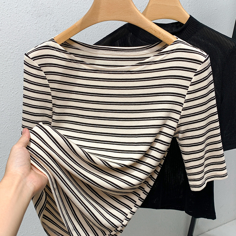 Camiseta de manga media de las mujeres 2023 nueva ropa de mujer europea clásica camiseta de media manga a rayas temperamento fuera del hombro cintura superior