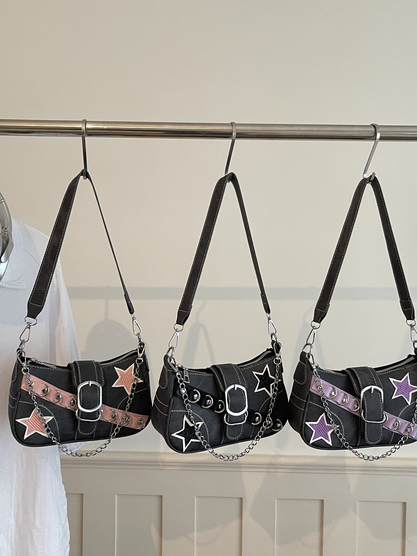 Nuevo diseño de nicho de moda en otoño e invierno 2026 cinturón rosa, palo de método estrella, bolso de hombro, bolso de mujer caliente, cadena de axilas, bolso de mujer