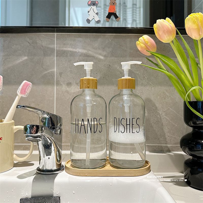 Gran volumen de vidrio nórdico envasado botellas vacías de baño desinfectante de manos gel de baño champú de presión en el lavabo de aire