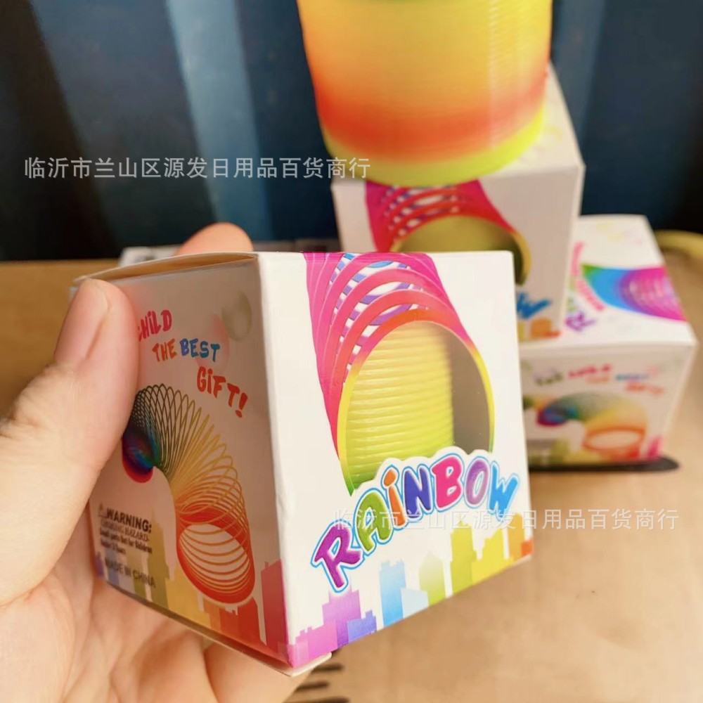 Anillo de arco iris de descompresión para niños anillo mágico jengle color anillo de primavera nostálgico de la infancia en caja 2 yuanes grandes almacenes al por mayor image 5