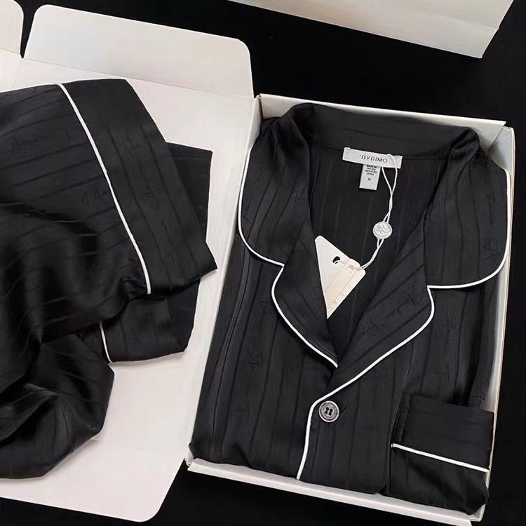 Pajamas de pareja de seda de hielo de alta calidad primavera y otoño de mujeres 2025 pantalones de manga larga de seda de imitación nueva ropa para el hogar de hombres