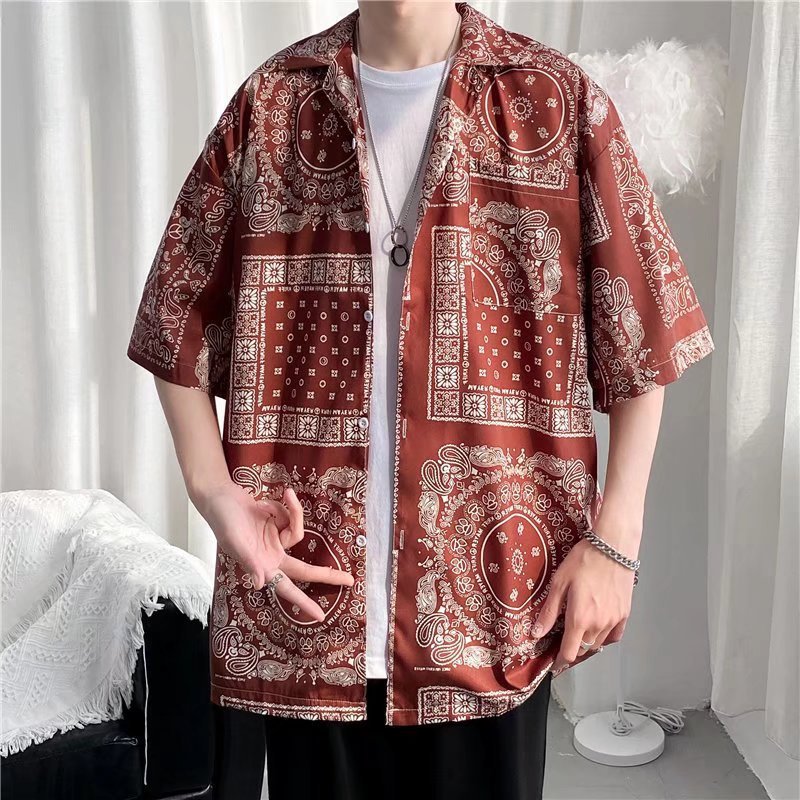 Hong Kong estilo Retro Vintage floral camisa de manga corta Estilo Hawaiano tailandés diseño sentido Ruan guapo camisa suelta para hombres y mujeres