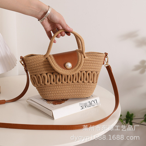 Direct Manufacturer Sale Shoulder Bag with Hollow Weaving, New Style Versatile Hand-held Cotton Thread Women's Bag Beach Vacation Style Sand Bag