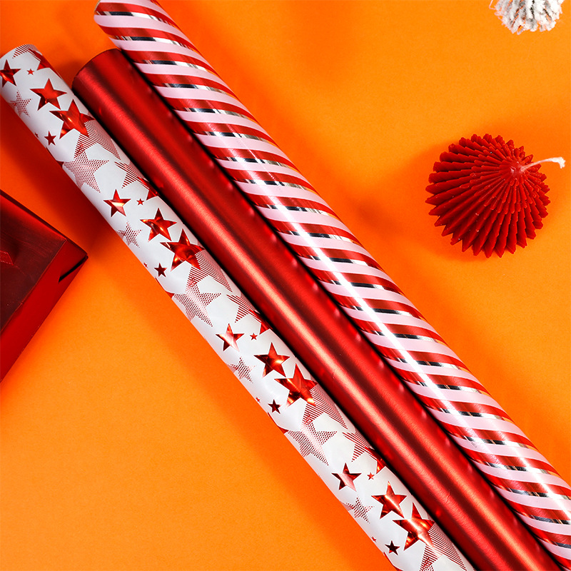 Transfronterizos para estrellas rojas estampadas de oro papel de embalaje de regalos de Navidad de lujo ligero papel de regalo de alto nivel DIY al por mayor