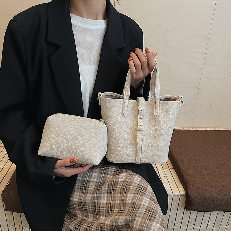 Nicho transfronterizo bolsas de cestas de verduras bolsas de cubo de mano otoño / invierno 2025 nuevo bolso de mujer moda retro mochila de hombro