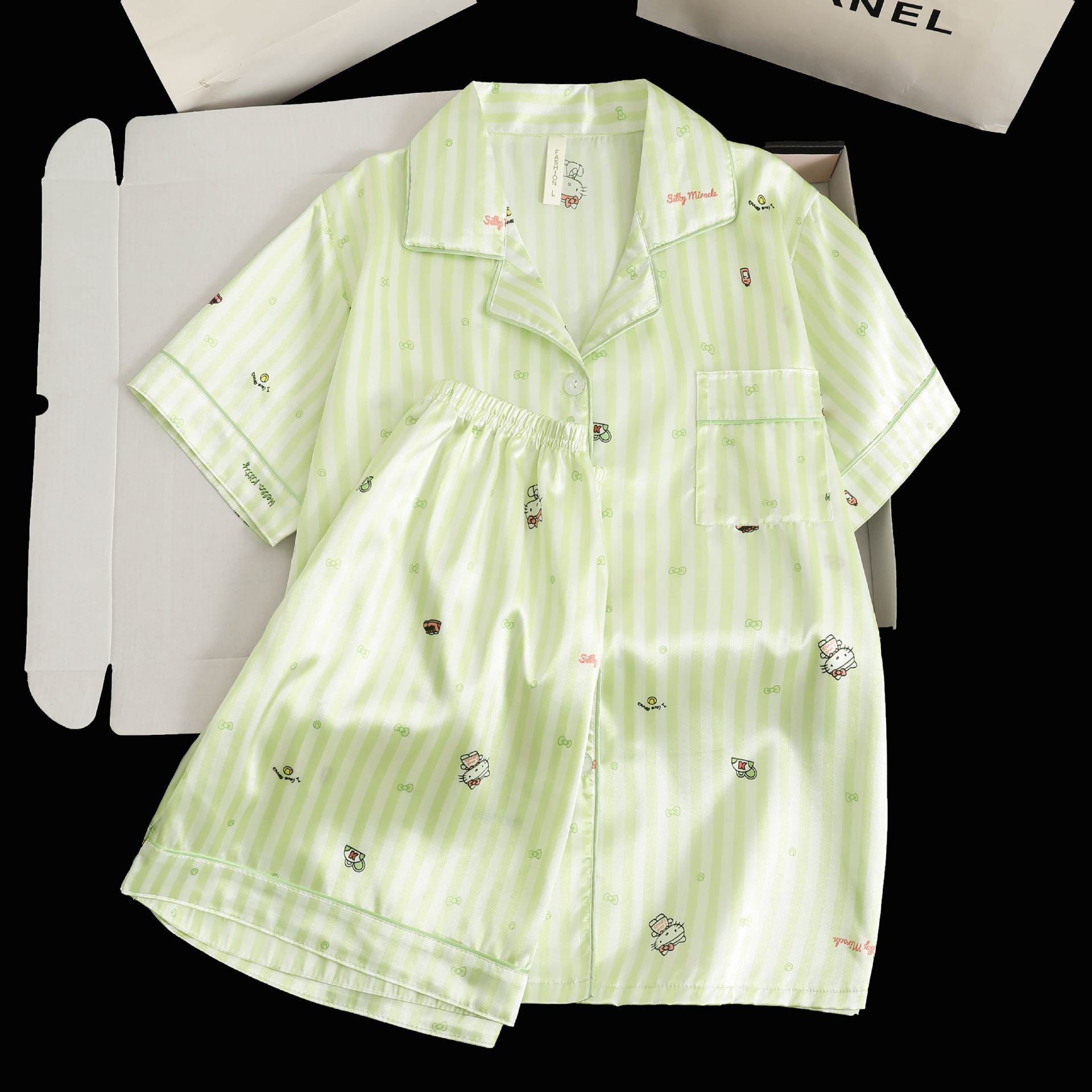 Textura al por mayor transfronteriza nueva seda de verano, pijamas de seda de seda de camisa, pantalones cortos de manga corta, set de solapa, seda explosiva