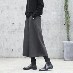 ウールの広脚ズボンの女性は秋冬の新型の9分のオリジナルのデザインの毛ラシャのズボンのゆったりしているファッションはやせている気質のスカートの女性を現します。