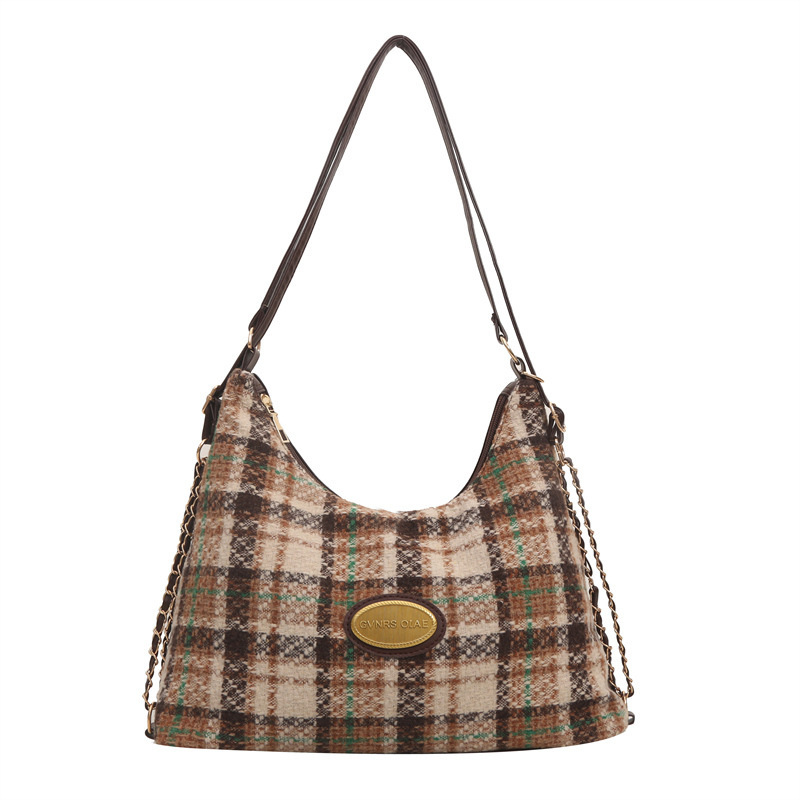 Bolsa de mano de lana retro de gran capacidad 2024 invierno nuevo estilo versátil bolso de brazo coreano bolso especial mochila mujer