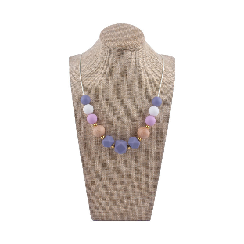 Los nuevos bebés de contraste de color de silicona octogonal mordedor collar de los bebés mordedor palo masticable colgante collar