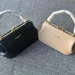 純色のレトロなクリップは韓国の東大門の女性カバンを包んで、シンプルなシングル肩の斜めショルダーバッグpuの女性カバンを持っています。