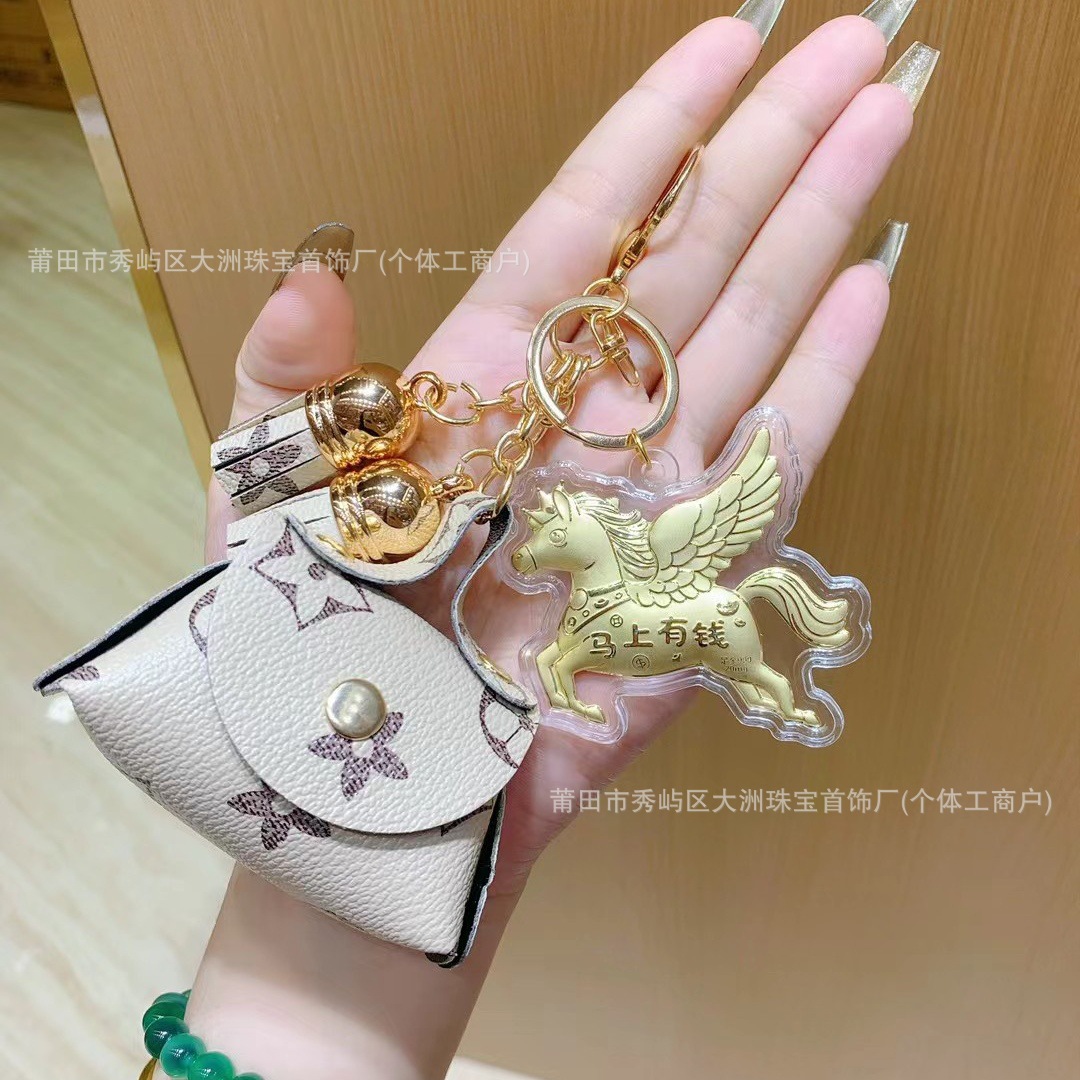 Año del Caballo de oro llavero de automóvil pequeño colgante 999 dinero de inmediato bolso llavero personalizado pequeño regalo