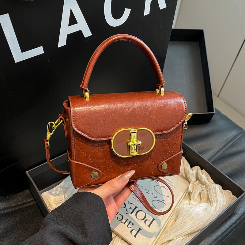 Bolso de mano super caliente para mujeres otoño invierno 2025 nuevo retro versátil bolso de hombro coreano bolso de mochila pequeña