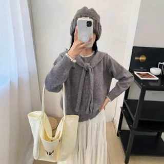 韩版袖口撞色毛衣女2026秋冬新款慵懒风百搭纯色披肩圆领针织开衫