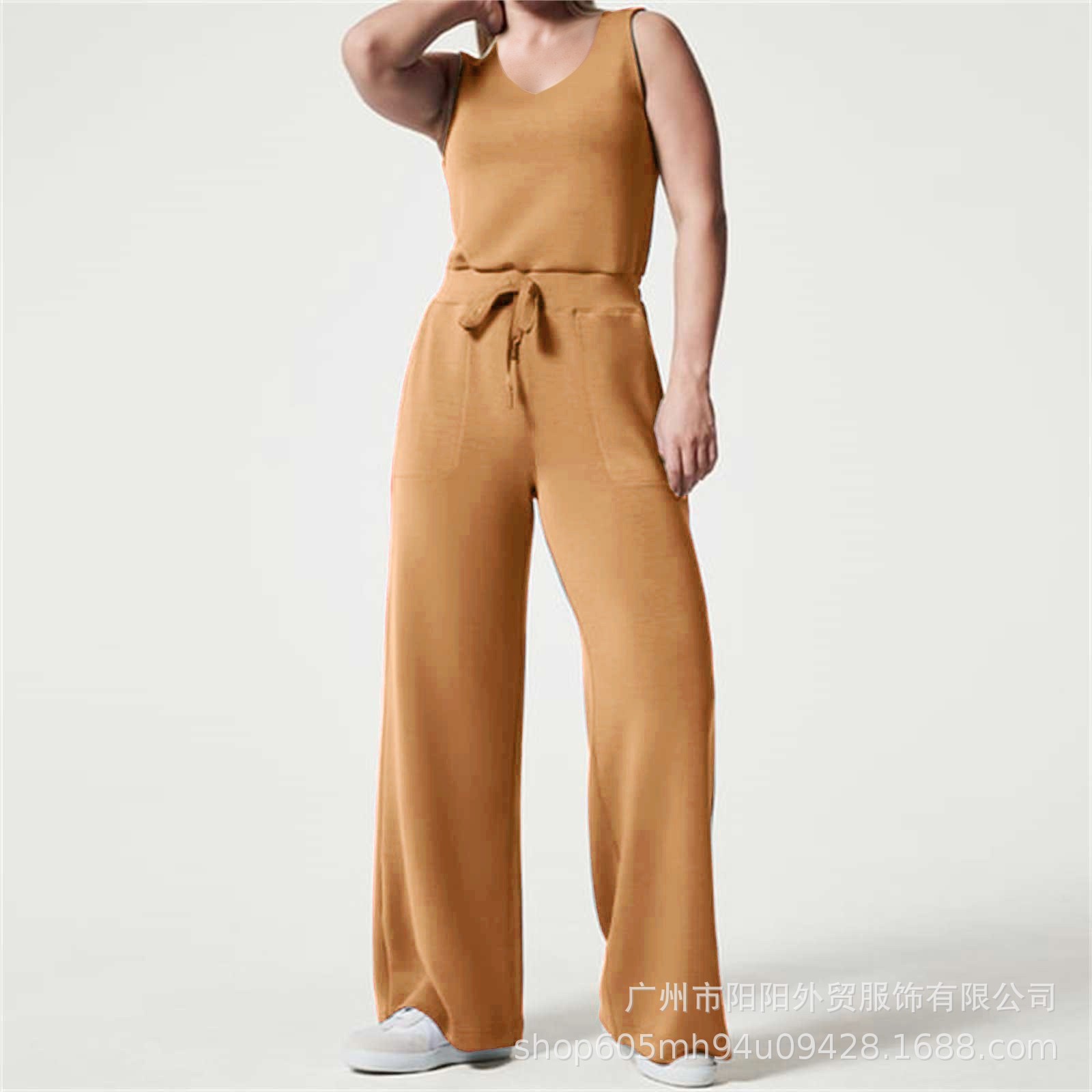 2023 primavera y verano nuevo versátil moda europea y americana adelgazamiento ocasional de las mujeres sin mangas color sólido V-cuello pantalones jumpsuit