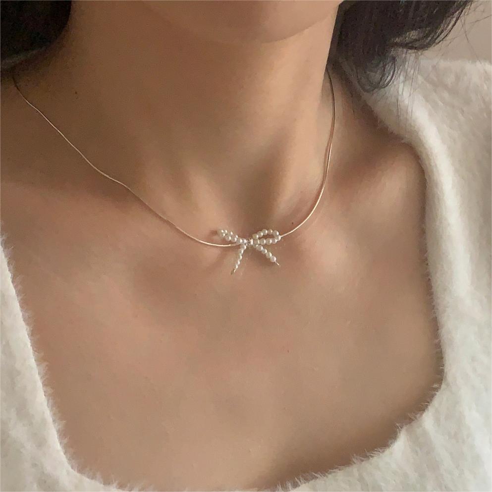 Sterling Silver Simple Style Bow Knot Pendant Necklace display picture 17