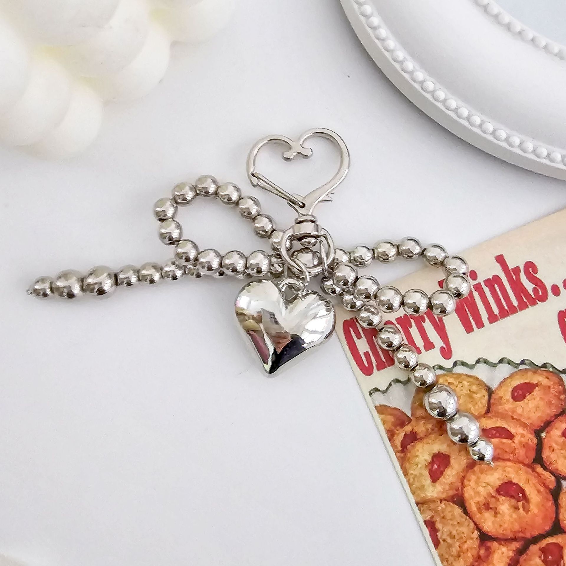 INS coreano arco de perla Go Ben cadena de amor llavero super universal perla simple colgante de bolsa