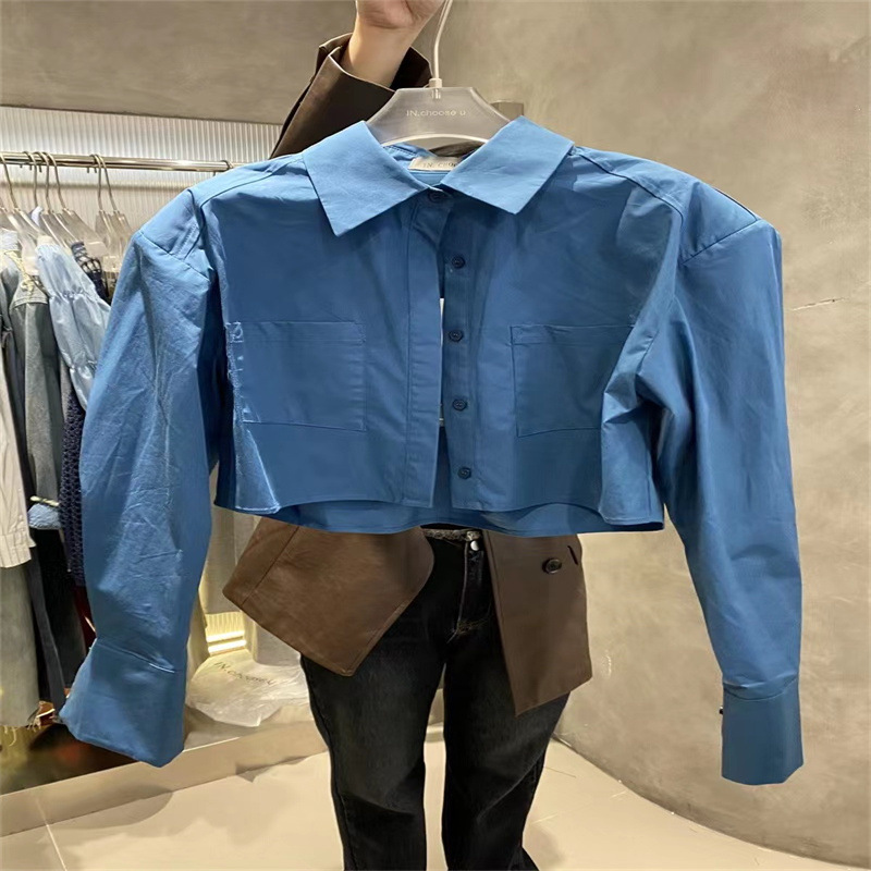 Nueva camisa de manga larga corta de color sólido de estilo coreano para niñas 2023 camisa suelta de bolsillo de solapa para niños medianos y grandes