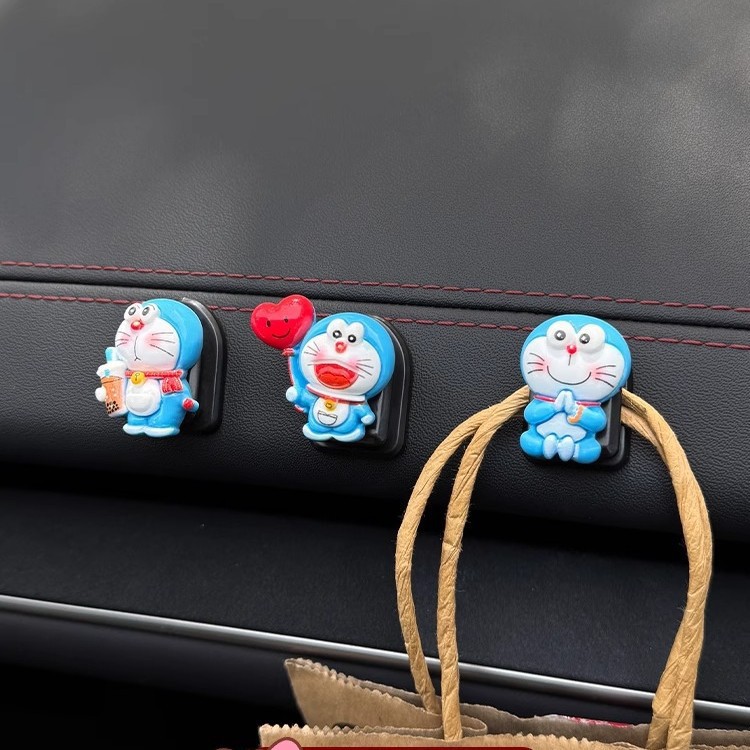 Gancho pequeño para el interior del automóvil, gancho de pasta multifuncional en la parte delantera del automóvil femenino, gancho de copiloto lindo para automóvil, celebridad de Internet