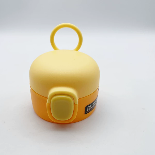 Little yellow duck hanging buckle (yellow on the top and orange on the bottom)