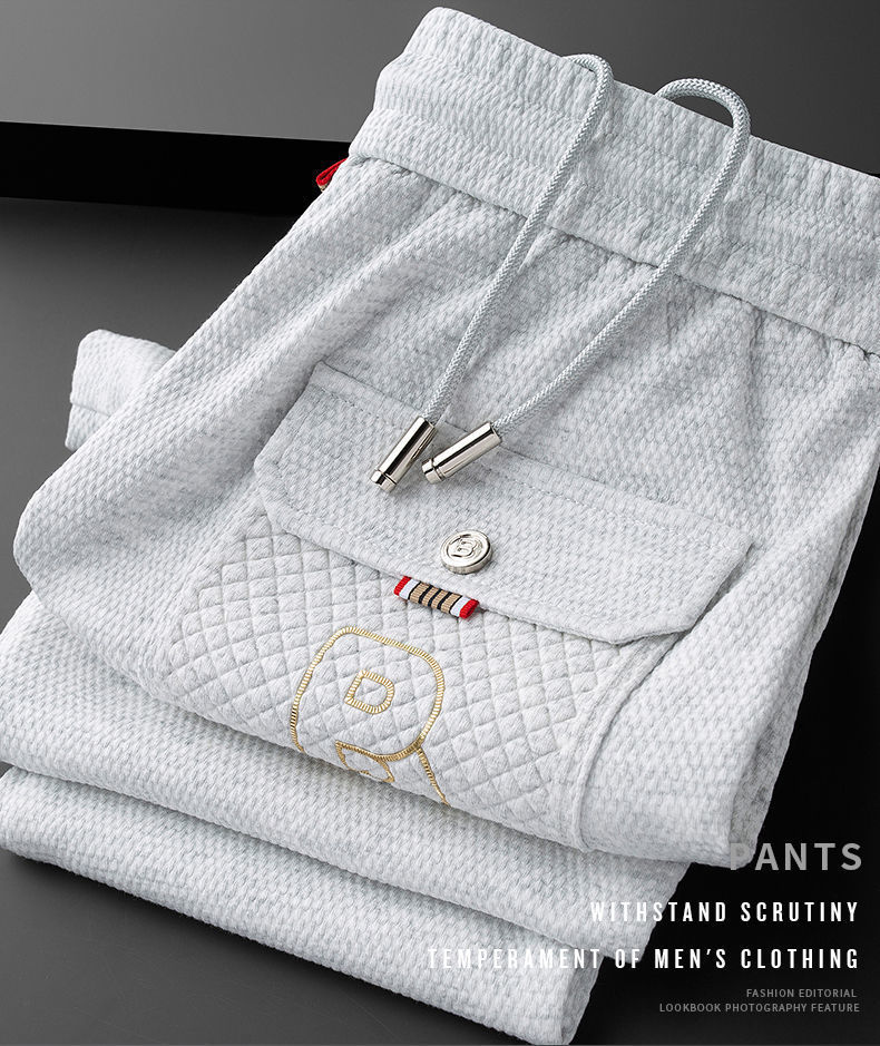 Jesenné pánske ležérne nové kórejské vydanie 2023 Trendové, módne, všestranné, priliehavé, módne športové nohavice pre mužov_voghion.com