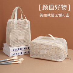 クロスボーダー新製品メッシュ化粧品バッグ多機能パーティション大容量ハイエンドポータブル旅行トイレタリー収納バッグ女性用