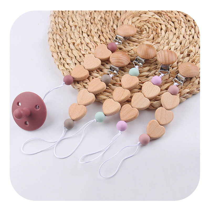 Productos para bebés y niños pequeños clip de tetina creativo caricatura bebé amor de beech mordida de dientes molares tetina cadena de prevención