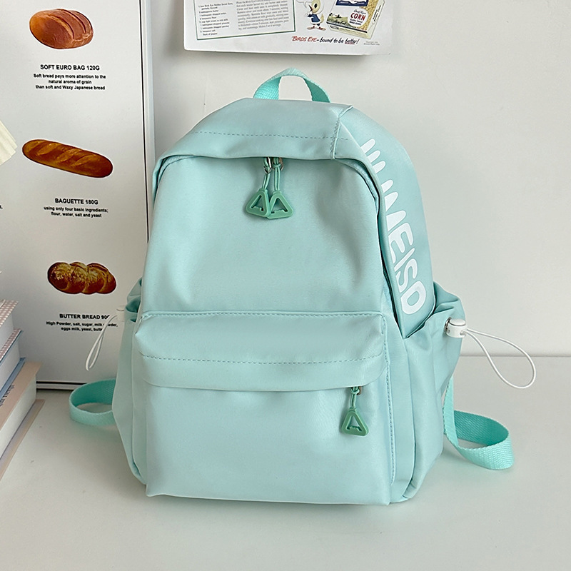 Mochila de gran capacidad para estudiantes de secundaria femenina simple y versátil para estudiantes de secundaria japonesa mochila de diseño