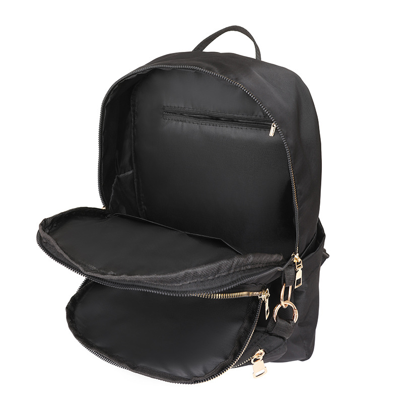 Fábrica al por mayor 2024 nueva mochila de nailon casual para mujer, mochila para madre y niño de viaje urbano de todo fósforo de moda