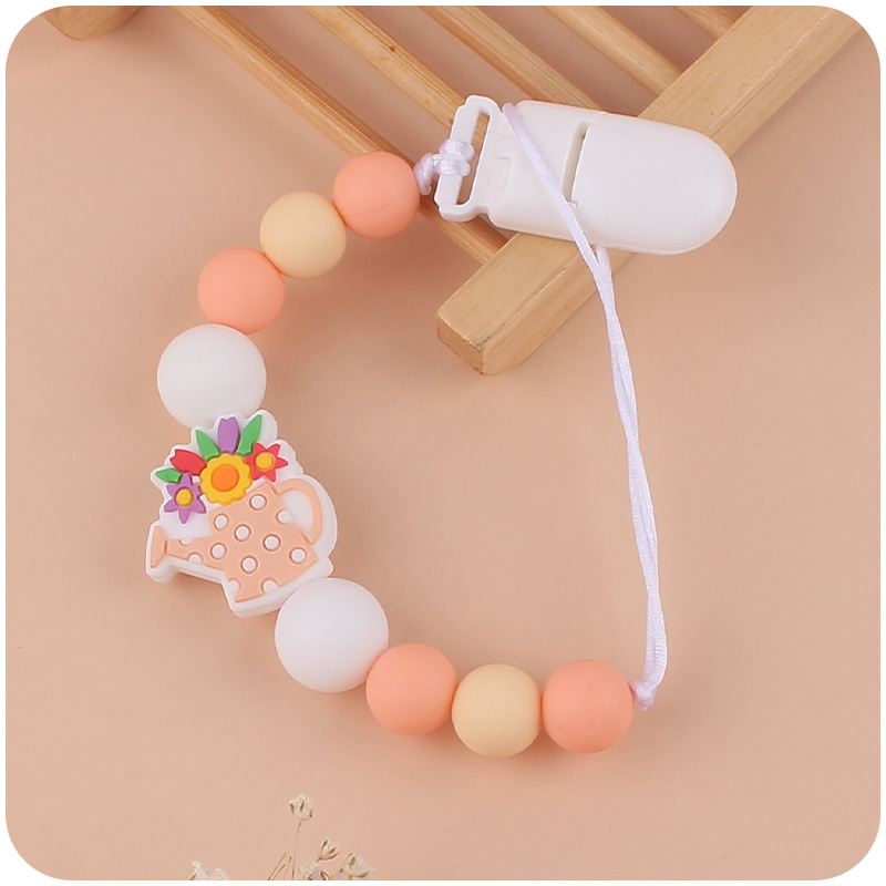 Bebé suministros de dibujos animados florero de silicona pequeño mordedor creativo DIY calmante bebé mordedura molar anti-gota cadena