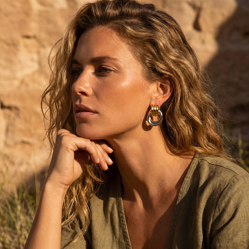 TENA Europa y los Estados Unidos transfronterizos en línea de color oro y plata aretes geométricos minimalistas de diseño de personalidad aretes al por mayor