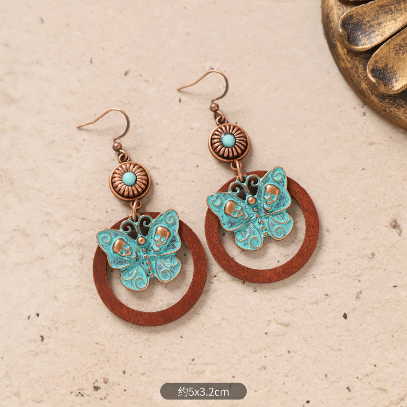 1- Log Bronze Butterfly