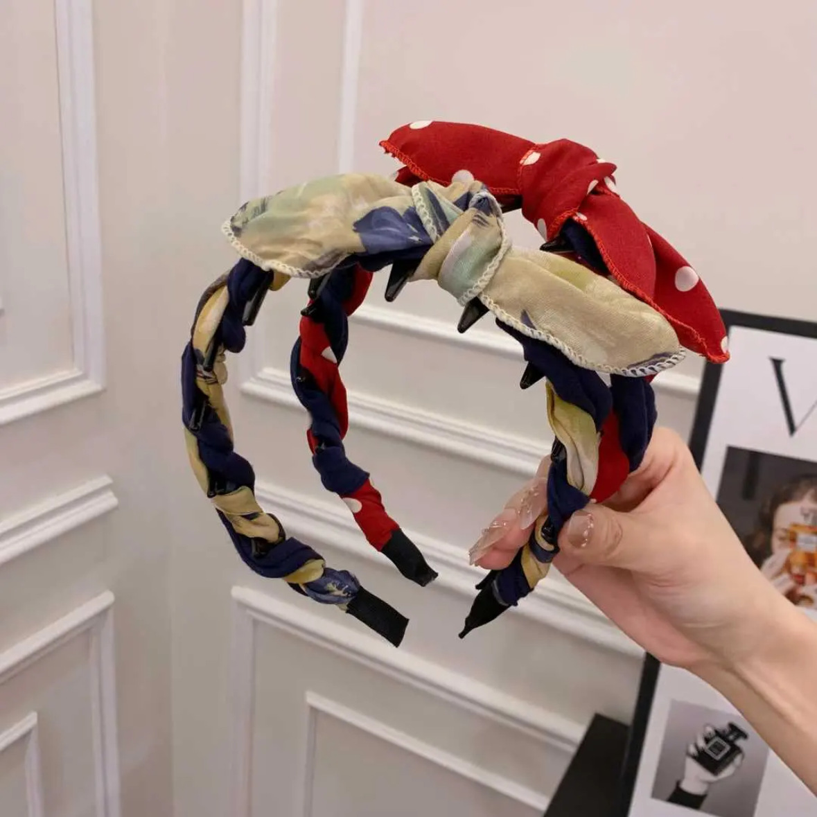 A red polka dot + an ink yellow contrasting rabbit ear comb headband